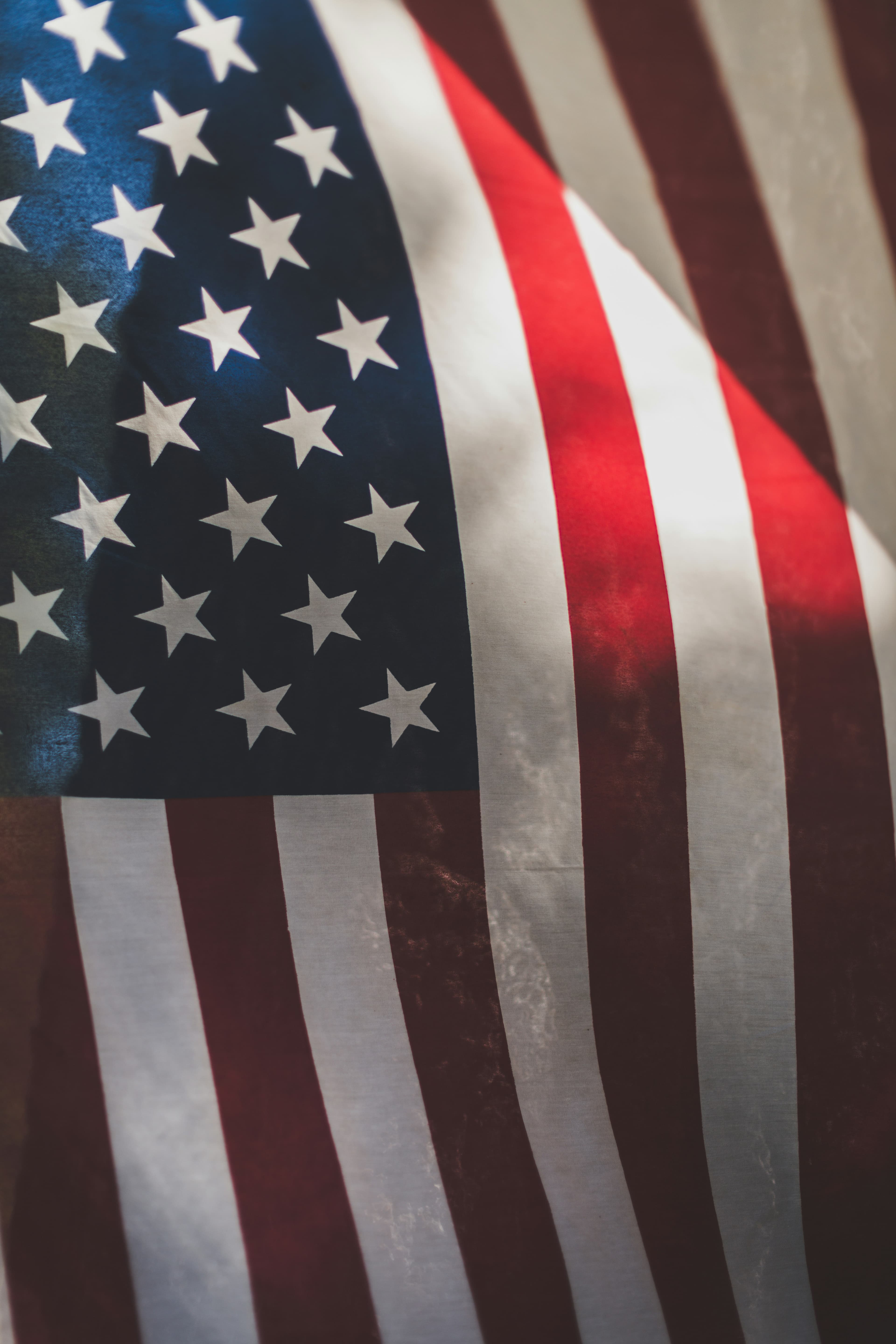 American flag background representing Contact Center USA industry solutions